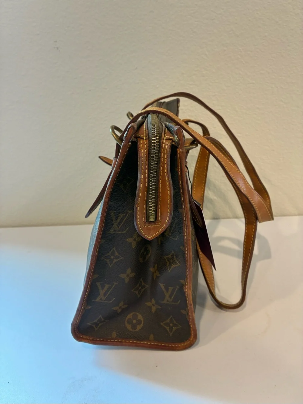 LOUIS VUITTON POPINCOURT HANDBAG.